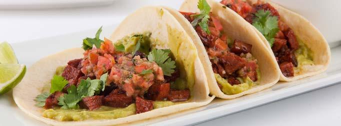 Chorizo Tacos SERVES 4-6 12 fresh four or corn tortillas, warmed in a skillet or griddle 1 package Jack s Gourmet Mexican style chorizo, diced small For the Guacamole: 2 avocados 1 Tb.