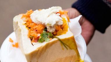 Bunny chow with bean curry and carrot salad Ingredients 400 g (2 cups) dried borlotti beans, rinsed, soaked overnight 125 ml (½ cup) vegetable oil 3 large onions, chopped 6 garlic cloves, crushed 2