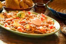 29 Make them Supremos with sour cream and guacamole - 9.99 Beef or Chicken Nachos Served with sour cream and guacamole - 11.99 Add Grilled Chicken or Carne Asada - 1.