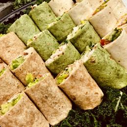 SANDWICHES Sandwich and Wrap packages include your choice of two sides. Artistically arranged on black platters with serving utensils, premium cutlery and plasticware.