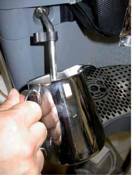then open the decaffenated coffee door, the - Pour n the powdered coffee - Close the decaffenated door - Press the desred dose key.