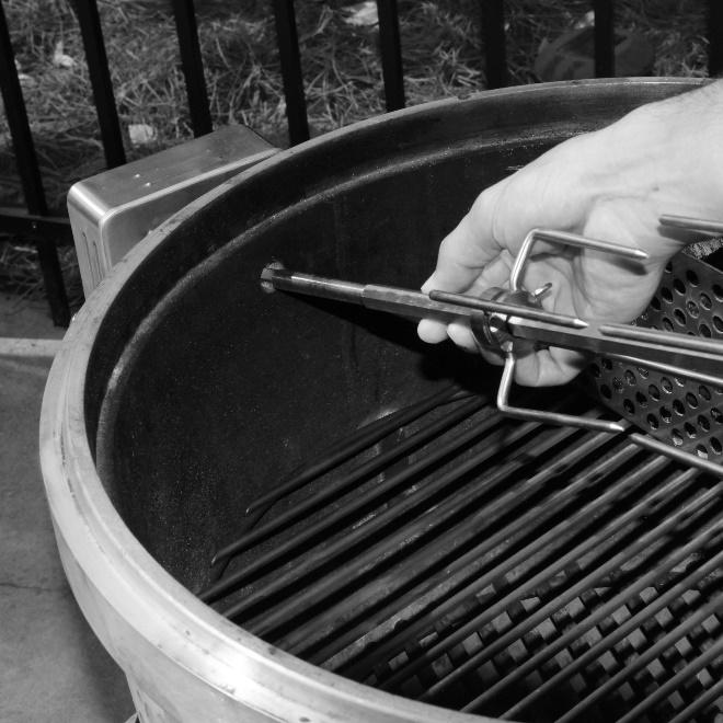 At this point, the rotisserie rod can be installed. The pointy end of the rod is accepted by the rotisserie motor.