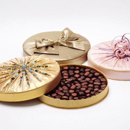 LUXURY HANDMADE COLLECTION For the statement gift, we offer a luxurious selection of exquisite chocolate boxes. Each one is handmade in England with the utmost care.