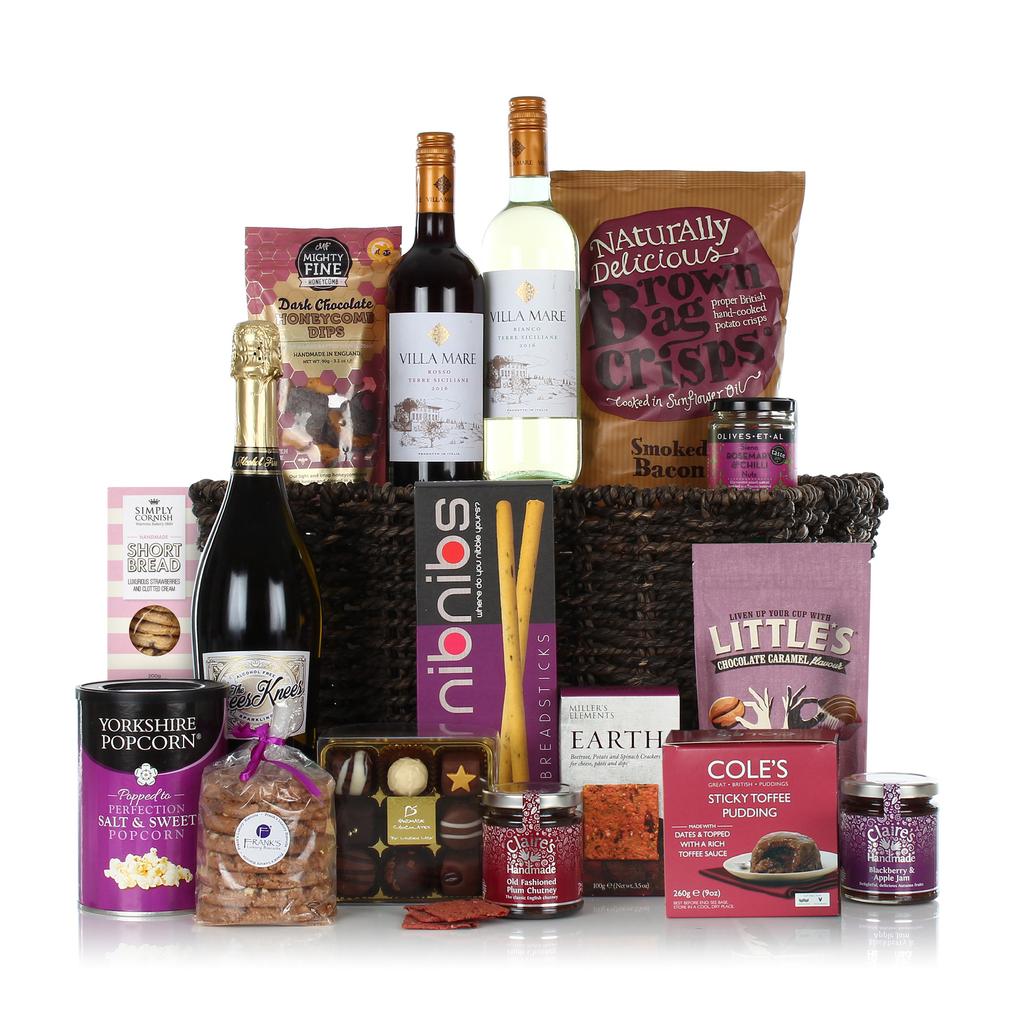 THE EXTRAVAGANCE Presented in a rope storage basket containing: Frank s Luxury Rocky Road Oaties in Bag with Purple Ribbon 300g Simply Cornish Strawberries & Cream Shortbread 200g Coles Sticky Toffee