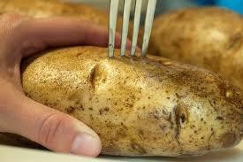 Method 1. Wash the potato and pierce with a fork then place in the oven. 2. Dice the onion and pepper in to small pieces.