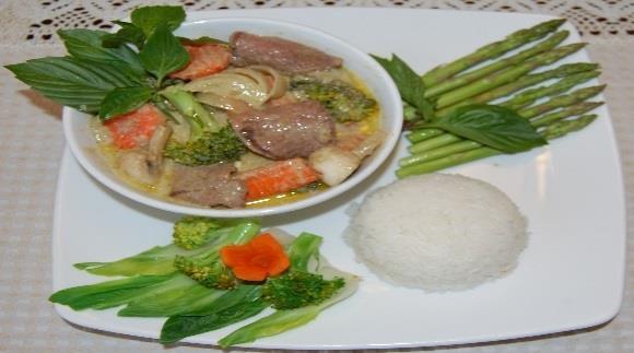 Specialty Green Curry - Ca -ri Tha i, served with a