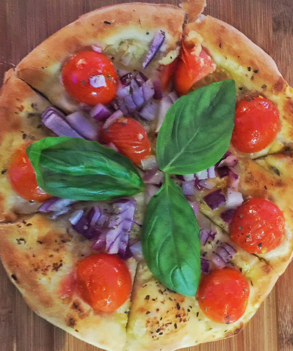 cheese Bruschetta Pizza Crust with fresh tomatoes, garlic, basil & E.V.O.