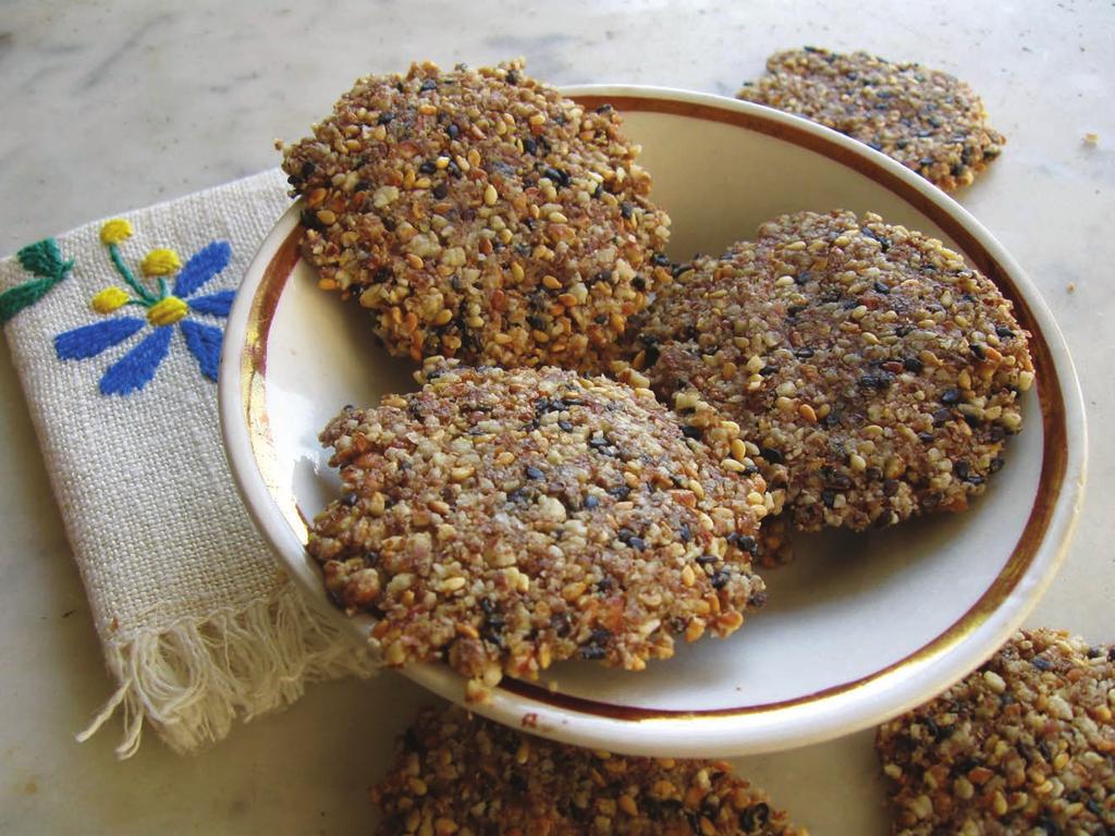 YIELD 38 CRACKERS PREP TIME 30 MINUTES COOKING TIME 10 HOURS Super seed crackers 1 1/3 CUPS WHOLE NATURAL ALMONDS 1/2 CUP GROUND FLAXSEED 1/3 CUP WHITE SESAME SEEDS, TOASTED 3 TABLESPOONS BLACK