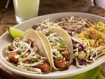 Fish Taco Breaded fish fillet with jack cheese, jalapeno cole slaw, cotija cheese and chipotle drizzle. Beef Fajita Taco Taco Excelente Three with rice & choice of beans.