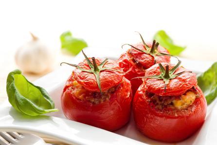 Stuffed Tomatoes SERVES 2 80g pine nuts 6 medium tomatoes Pinch of basil Pinch of parsley 5 tablespoons chopped chives 2 springs of oregano ½ red pepper (diced) 10ml olive oil ¼ clove of garlic Pinch
