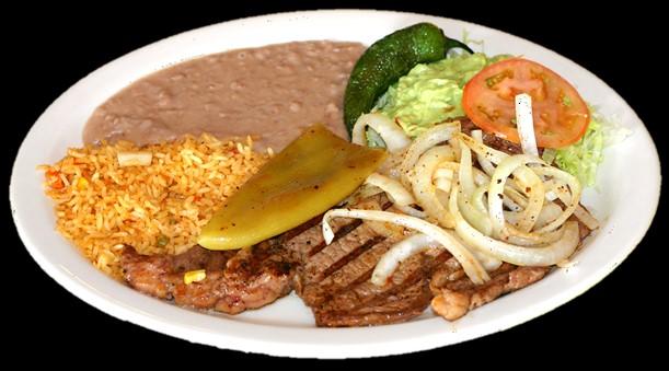 25 10 oz rib eye steak served with grilled onions, tomatoes, jalapenos, beans, rice and a si of guacamole.