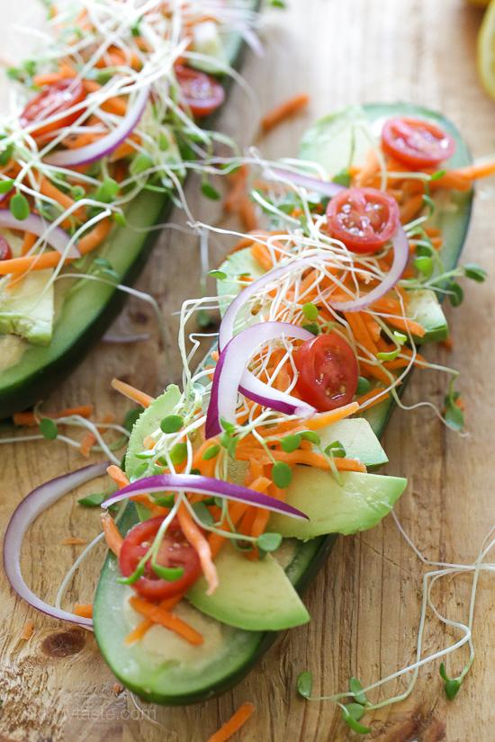 5mg Carbohydrates: 19g Fiber: 8g Sugar: 1g Protein: 6g INGREDIENTS: 1 cucumber, cut in half lengthwise 6 tbsp hummus 1/4 cup shredded carrots 1/4 cup sprouts 1/4 cup tomato 1/4 cup red