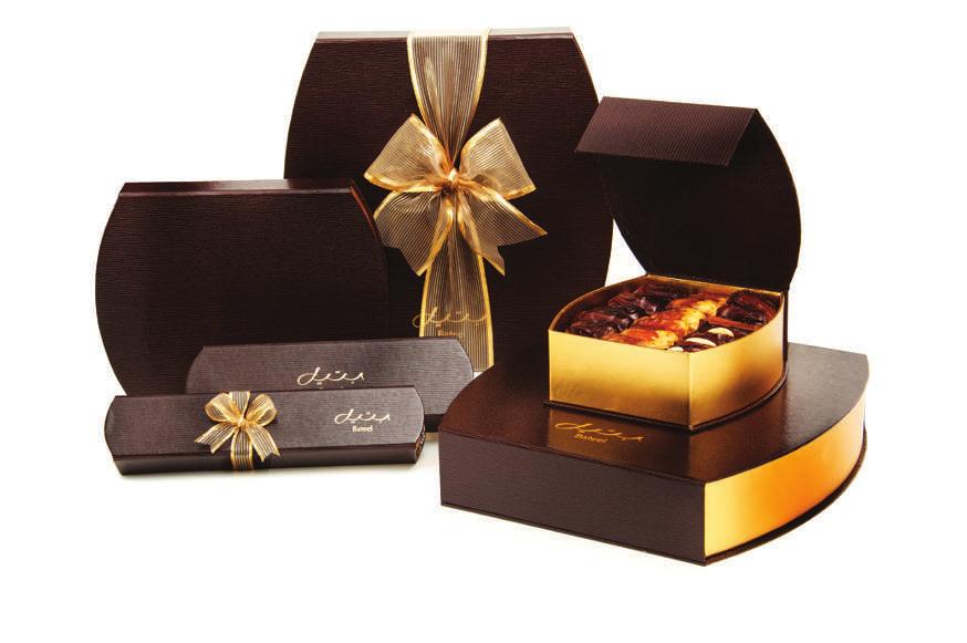 BARREL BOXES Barrel shaped boxes with a rich, dark brown leatherette finish.