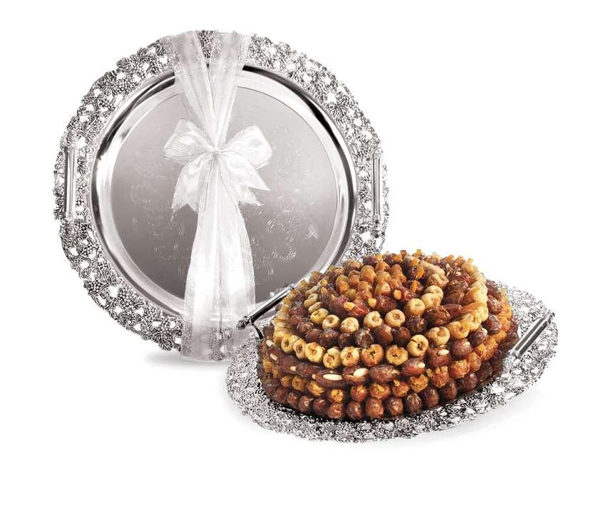 MINERVA SILVER TRAYS Round silver trays with a richly decorated border SMALL LARGE CONTENTS P25691148