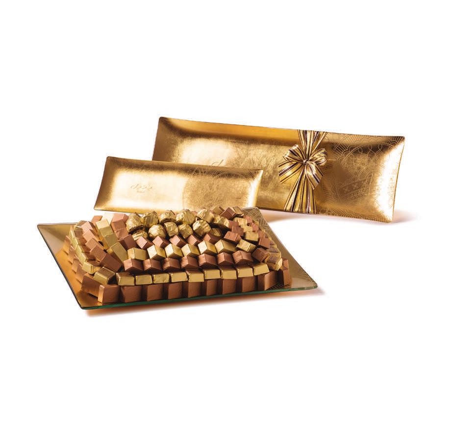 JUNO SLIM TRAYS Rectangular glass trays with a gold leaf finish imprinted with the Bateel henna pattern SMALL LARGE WIDE CONTENTS