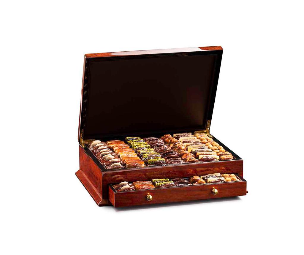 WOODEN DRAWER A traditional elegant wooden chest with drawers CONTENTS ASSORTED DATES ASSORTED FILLED