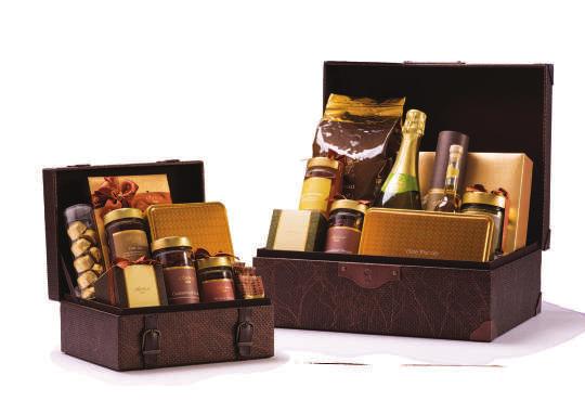 ALINA CHEST HAMPERS Gold and brown leather chests in a rich damask