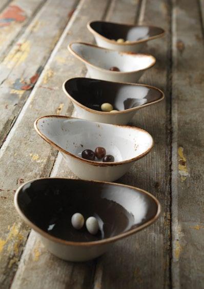 The gem-like glazes married to simple forms and shapes produce a unique and