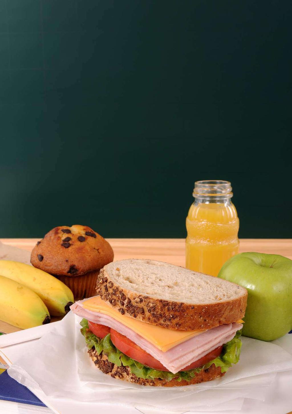 STUDENT VALUE KIDS LUNCH BOX [Carrier bag or multi- coloured lunch box] Wholesome Sliced Bread Sandwiches grated cheese /chicken/cold meat Assorted flavoured cheese curls Ceres Juice Lollipops