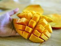 Standing up the mango up like this you should be able to imagine the alignment of the flat, oval pit inside of it.