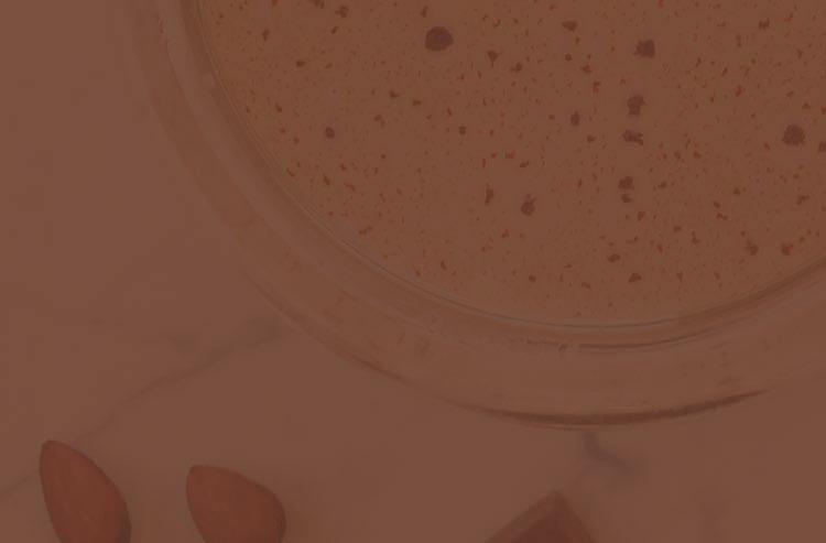 sugar 1/8 teaspoon almond extract (to taste) Cocoa powder Heat milk Steep tea bag in hot milk for 5