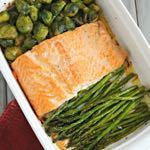 DAY 2 EASY BAKED SALMON M A I N D I S H Serves: 4 Prep Time: 10 Minutes Cook Time: 20 Minutes 1 large salmon filet 1 bag frozen brussels sprouts, steamed 1 bunch asparagus 2 Tablespoons olive oil