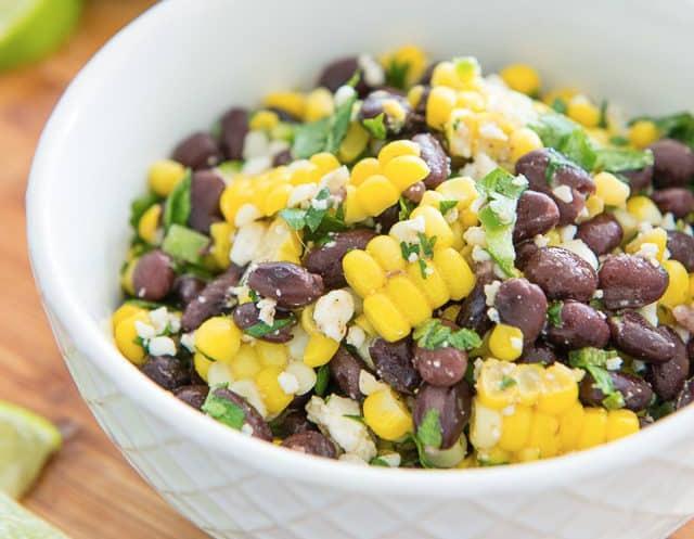 Mexican Corn Salad Prep time: 10 minutes Serving size: ½ cup [125 ml] 2 cups frozen corn [500 ml] 1 red pepper ½ red onion 1 can black beans, drained 1 medium zucchini 1 cup cilantro leaves [250 ml]