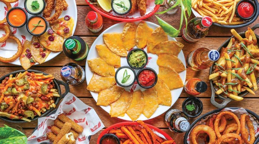 served with guacamole, salsa and sour cream add bacon crisps 3.5 jalapenos 1.0 CHICKEN QUESADILLAS BASKET FRIES 7.0 BASKET SWEET POTATO FRIES 9.9 ONION RINGS 9.