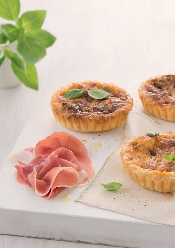Mini Tartlets WITH ROASTED RED ONIONS, BASIL & GOATS CHEESE Prep 15 mins Cooking time 20 mins Serves 4-6 1 red onion, cut 1cm diced extra virgin olive oil 3 eggs 100mL cream 25mL milk 30g Parmigiano