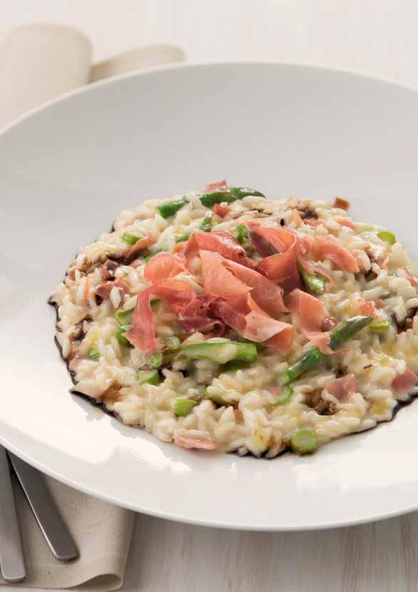Risotto Alla Parmigiana WITH ASPARAGUS, AGED BALSAMIC REDUCTION & PROSCIUTTO DI PARMA Prep 15 mins Cooking time 16-18 mins Serves 4 1 4 onion, finely chopped 100g butter, unsalted 20mL extra virgin