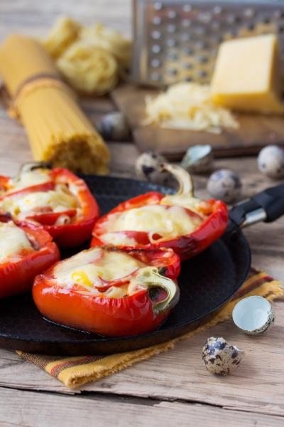 Roasted Peppers with Pine Nuts Lunch Serves: 4 4 Red Peppers 250g Mozzarella Cheese, grated 2 Garlic Cloves, crushed 2 Eggs, beaten 50g Pine Nuts 2 tbsp Olive Oil 1.