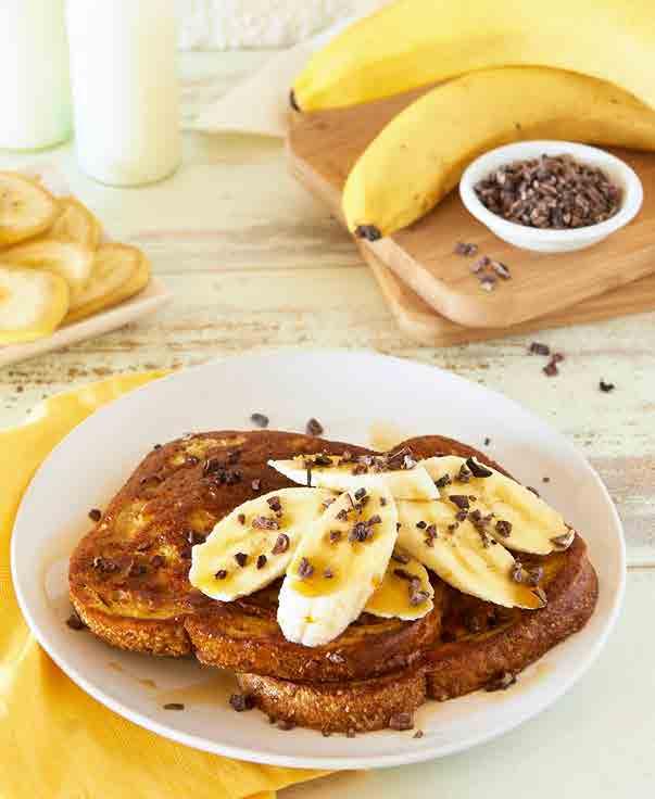 CACAO, BANANA & MAPLE FRENCH TOAST SERVES 1 334 per serve 1 free-range egg 1 & 1/2 tbsp reduced-fat milk of choice Cooking oil spray 2 slices wholegrain or gluten-free bread of choice 1/2 banana,