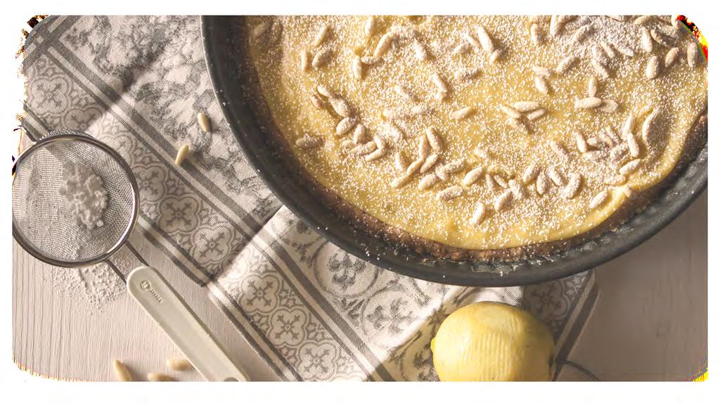 Torta della Nonna DESSERT 70 DIFFICULTY: HARD 300 gr of 00 flour 250 gr of sugar 100 gr of extra virgin olive oil 5 egg yolks 1 and a half egg white 8 gr of baking powder Vanillin to taste Lemon zest
