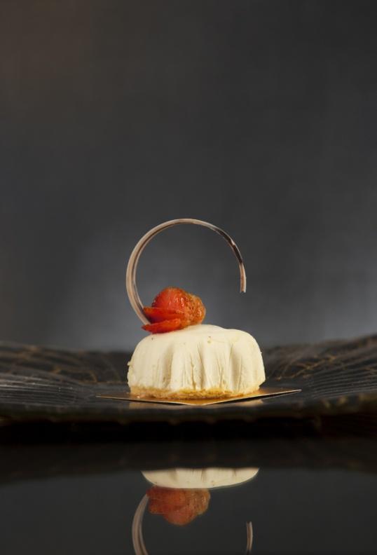CAKE TEMPTATIONS MONT BLANC A velvety white chocolate mousse, shaped in a snow-capped mountain, filled with marmalade and diced orange peel, perfectly enhanced with Cointreau orange liqueur.
