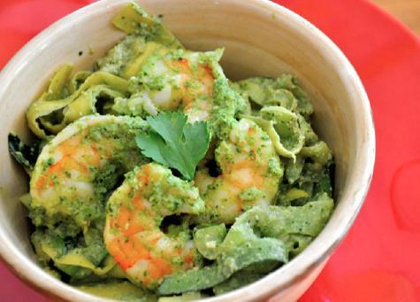 Shrimp and Noodles Makes 4 Servings Ingredients 4 zucchini ½ cup macadamia nuts 2 cups fresh basil leaves 2 garlic cloves 1/3 cup nutritional yeast Dash of sea salt Juice of ½ lemon ¼ cup olive oil 2