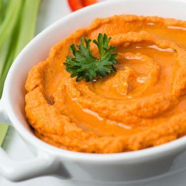 Roasted Red Pepper Humus In an electric blender or food processor, puree the chickpeas, red peppers, lemon juice, tahini, garlic, cumin, cayenne, and salt.