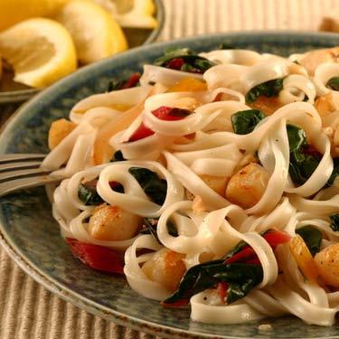 Scallops and Swiss Chard Sauté Toss Notta Pasta with sweet bay scallops and ruby red or bright lights Swiss chard for a deliciously healthy dinner.