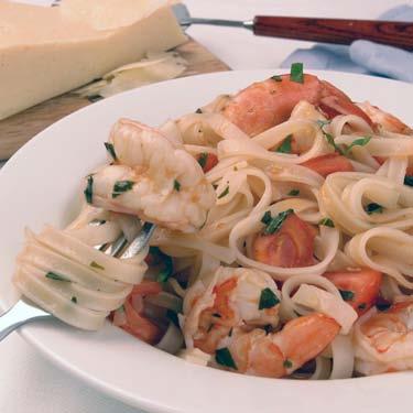 Basil Tomato Notta Pasta Scampi This fresh tasting scampi has a summer flair. Mixing it with lemon juice, wine and rice pasta takes it to a new dimension of flavor.
