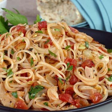 Clam Sauce with Tomatoes Our thin rice pasta works well with all the classic flavors of clams and garlic. It s a quick recipe to prepare from basic pantry items.