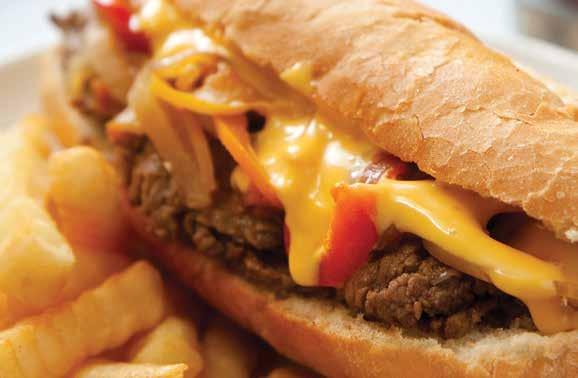 BEST IN TOWN! Cheesesteaks 8 oz. steak or chicken. No charge for sauce and onions with chips and a pickle. Fries additional 1.50 Long hot peppers available upon request. Philly Steak 7.