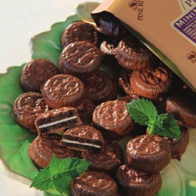 Walnut and fudge truffle centers are drenched in milk chocolate.