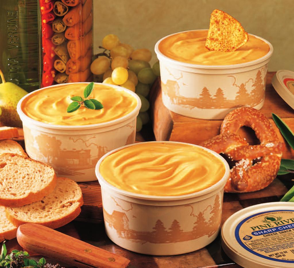 About Our Snack Spread Pine River Snack Spread is a pasteurized blend of natural Cheddar cheese and other dairy ingredients. Flavored with herbs and spices.