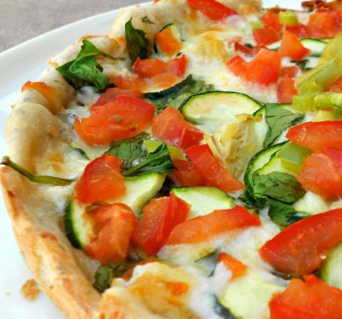 Gourmet vegetarian Pizza Serves 6 prep time: 10 mins Cook time: Varies 1 unbaked pizza crust 1 cup ranch dressing 1 Tablespoon minced garlic 1 Tablespoon Parmesan cheese 1 tsp garlic salt Dash of