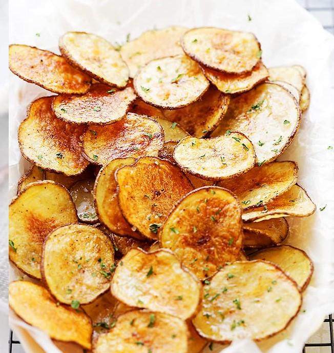 Chili Lime Potato Chips Cinnamon Apple Chips 2 qt. vegetable oil 1 lb. russet potatoes, peeled 2 limes, grated on a microplane Seasoning ¼ dried ancho chile, seeded and hand-torn into pieces ½ tsp.