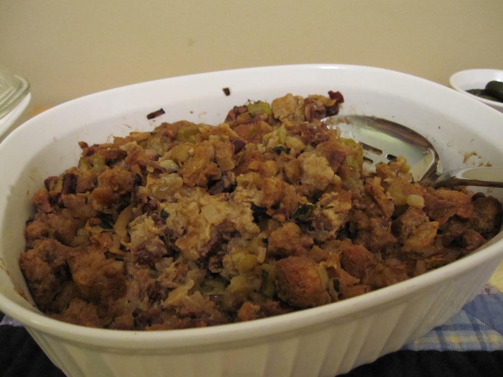 Savory Dijon Stuffing 1 cup butter, melted 1/2 cup Dijon-style prepared mustard 2 cups chopped onion 1 1/2 cups chopped celery 1 (8 ounce) can water chestnuts 1 cup chopped walnuts 1/4 cup chopped