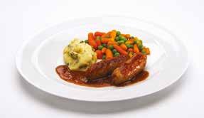 Three slices of pork shoulder in gravy, served with roast potatoes, diced carrots and peas. Sliced gammon in pineapple sauce, served with diced fried potatoes, carrots and Romano beans.