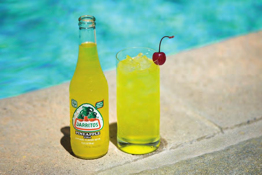 PINEAPPLE EXPRESS Tall glass filled with ice 45ml Coconut Rum Jarritos Pineapple Cherry Fill glass with ice, add