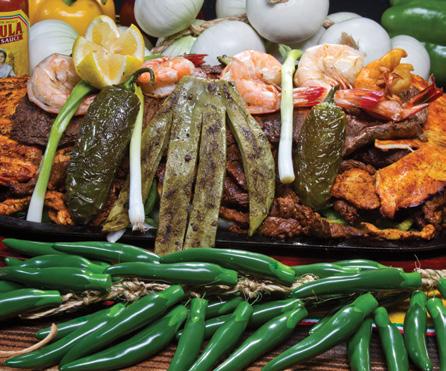 99 Shrimp Fajitas Jumbo shrimp and vegetables, served with rice, beans, guacamole salad, pico de