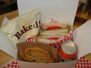 BOXED LUNCHES Minimum 15 people or additional $150 fee applies. All Boxed Lunches include potato chips, apple, individually wrapped cookie, dill pickle, and choice of canned soda.