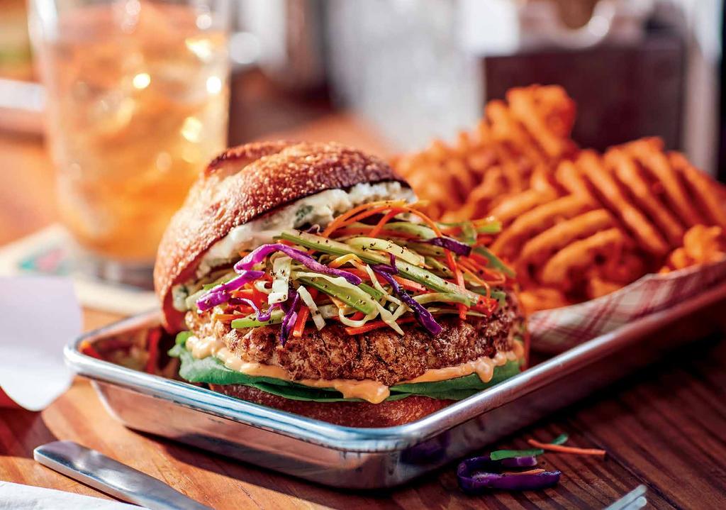 Buffalo Chicken A monster of a chicken burger with blue cheese mayo & buffalo sauce. Topped with a cooked vegetable slaw.